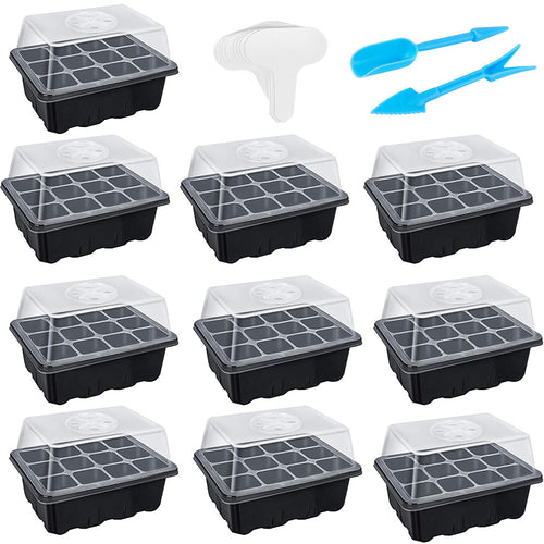 Set of 12 black seed trays with clear lids and two blue plastic tools on a white background.