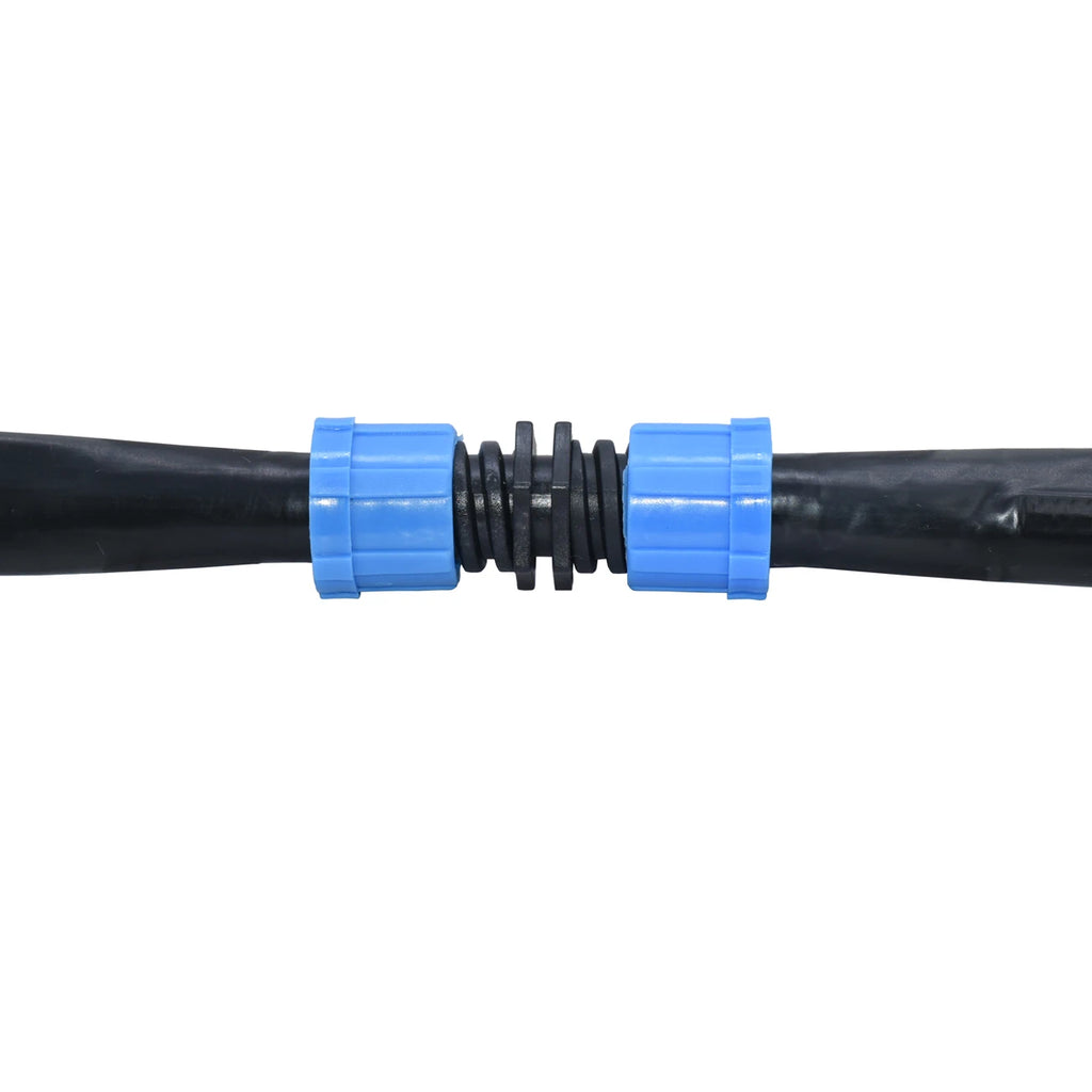 A close-up of a black hose connector with two bright blue plastic end caps and a black corrugated center section, shown against a plain white background.