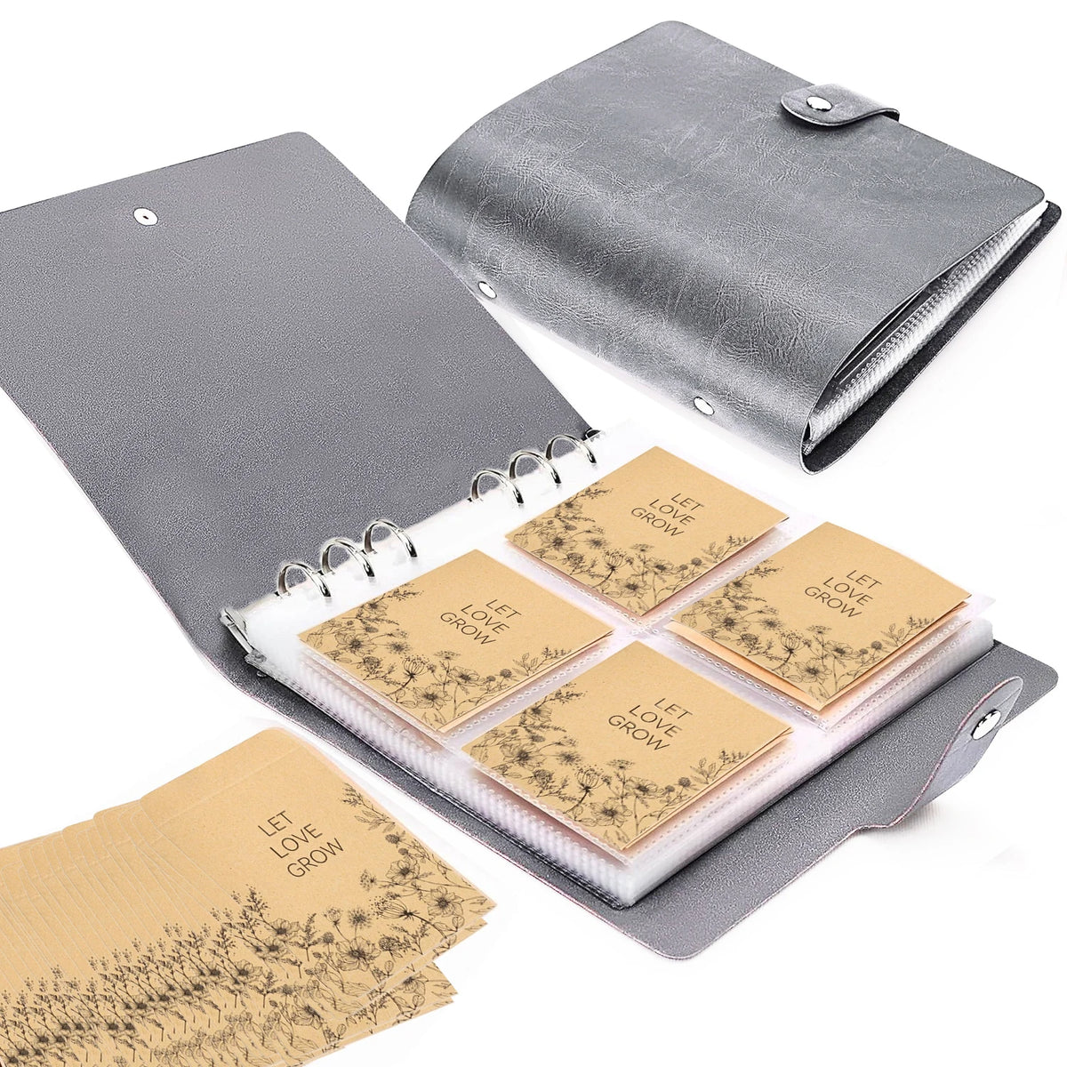 Gray planner with open pages displaying seed packets labeled 'Let Love Grow'.